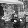 The group hangs out at camp on Sat morning